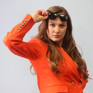 Carrie Welch, Director of People at Sunline Global wearing sunglasses
