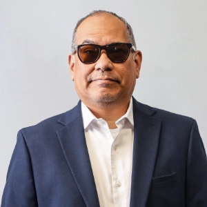 Gilbert Balboa, Director of International Operations and Customer Experience at Sunline Global wearing sunglasses