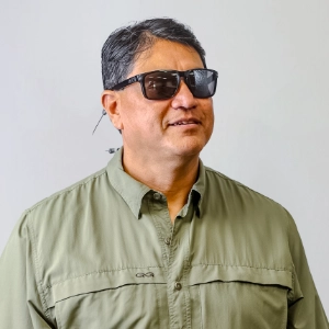 Jaime Cazares, Director of Safety and Maintenance at Sunline Global wearing sunglasses